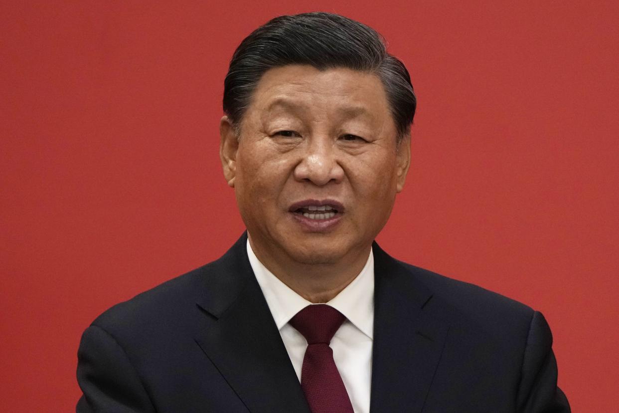 Chinese President Xi Jinping speaks at an event to introduce new members of the Politburo Standing Committee at the Great Hall of the People in Beijing, Sunday, Oct. 23, 2022. 