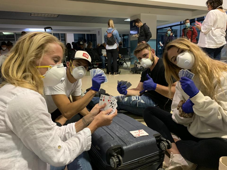 Members of John Vellinger's family wait for a flight home from Guatemala where they were stranded in March before Sen. Todd Young's office helped them find a way home.