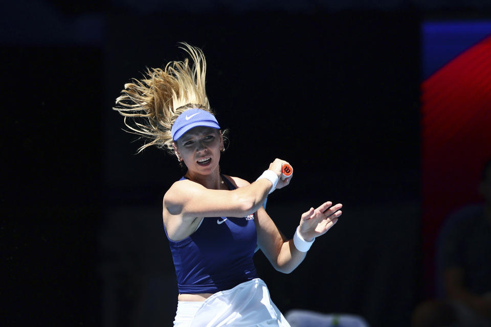 Katie Boulter of Britain plays a shot to Jessica Pegula of the United States during the United Cup tennis tournament in Perth, Australia, Sunday, Dec. 31, 2023. (AP Photo/Trevor Collens)