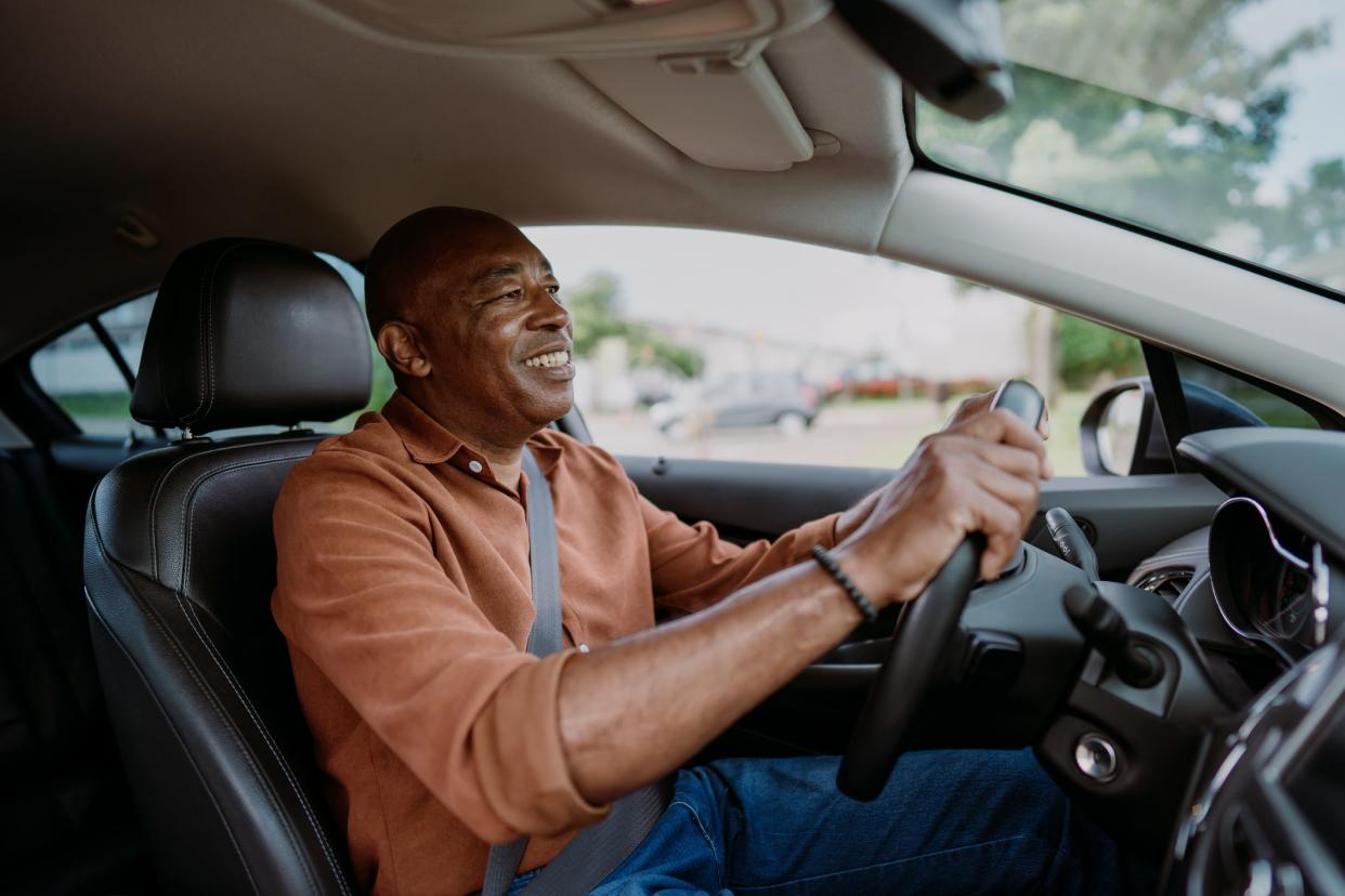 Portrait of a mature male driver in the car