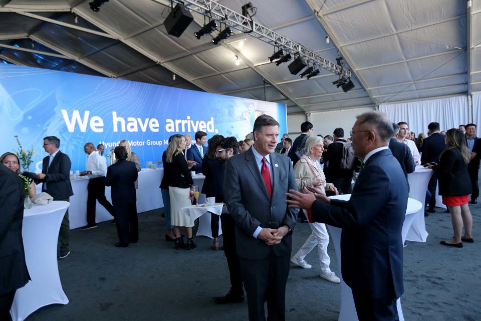 Hyundai Motor Group Executive Chair Chung Eui-sun talks with Griff Lynch, executive director Georgia Ports Authority on Tuesday October 25, 2022 before the official groundbreaking ceremony for the Hyundai EV manufacturing facility at the Bryan County mega site near Ellabell Georgia.