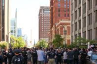 Law enforcement officers gather in support of two police officers who were arraigned in Buffalo