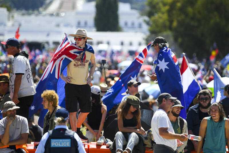 People take part in a ‘Convoy to Canberra’ protest outside Parliament House in Canberra, Saturday.