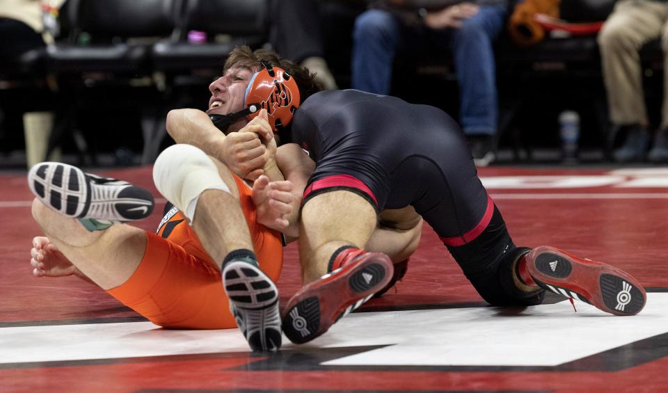 Rutgers' Joey Olivieri has Princeton's Nick Kayal on his back during the 133-pound bout Friday night in the Scarlet Knights' 24-13 win over the Tigers.