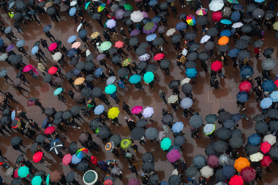 Men and women flock to Castle Square in Warsaw.&nbsp;