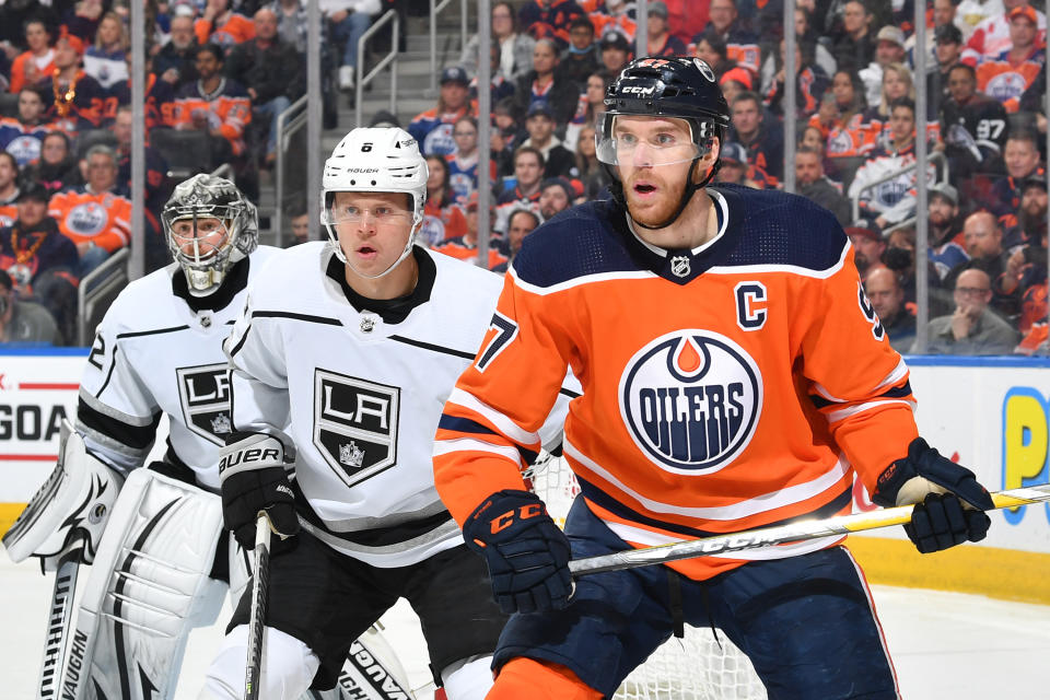 EDMONTON, AB - MARCH 30: Connor McDavid #97 of the Edmonton Oilers battles for position against Olli Maatta #6 of the Los Angeles Kings on March 30, 2022 at Rogers Place in Edmonton, Alberta, Canada. (Photo by Andy Devlin/NHLI via Getty Images)