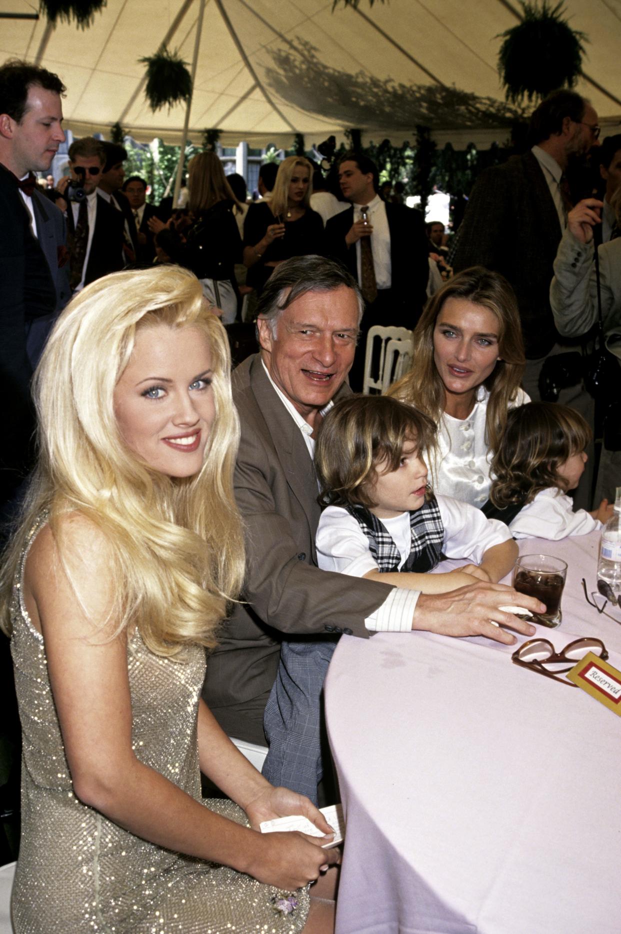 Jenny McCarthy, 1994 Playmate of the Year, with Hugh Hefner and family celebrating at the VSDA Convention in Las Vegas.
April 28, 1994
©RTNBarrett / MediaPunch/IPX