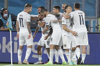 Italian players celebrate scoring their side's third goal during the Euro 2020 soccer championship group A match between Turkey and Italy at the Olympic stadium in Rome, Friday, June 11, 2021. (Ettore Ferrari/Pool via AP)