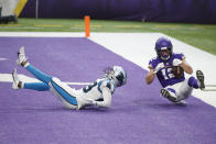 Minnesota Vikings wide receiver Chad Beebe catches a 10-yard touchdown pass over Carolina Panthers cornerback Corn Elder, left, during the second half of an NFL football game, Sunday, Nov. 29, 2020, in Minneapolis. The Vikings won 28-27. (AP Photo/Bruce Kluckhohn)