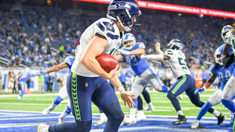 Michael Dickson runs out of the end zone with a fake punt to make a first down. (Photo by Steven King/Icon Sportswire via Getty Images)