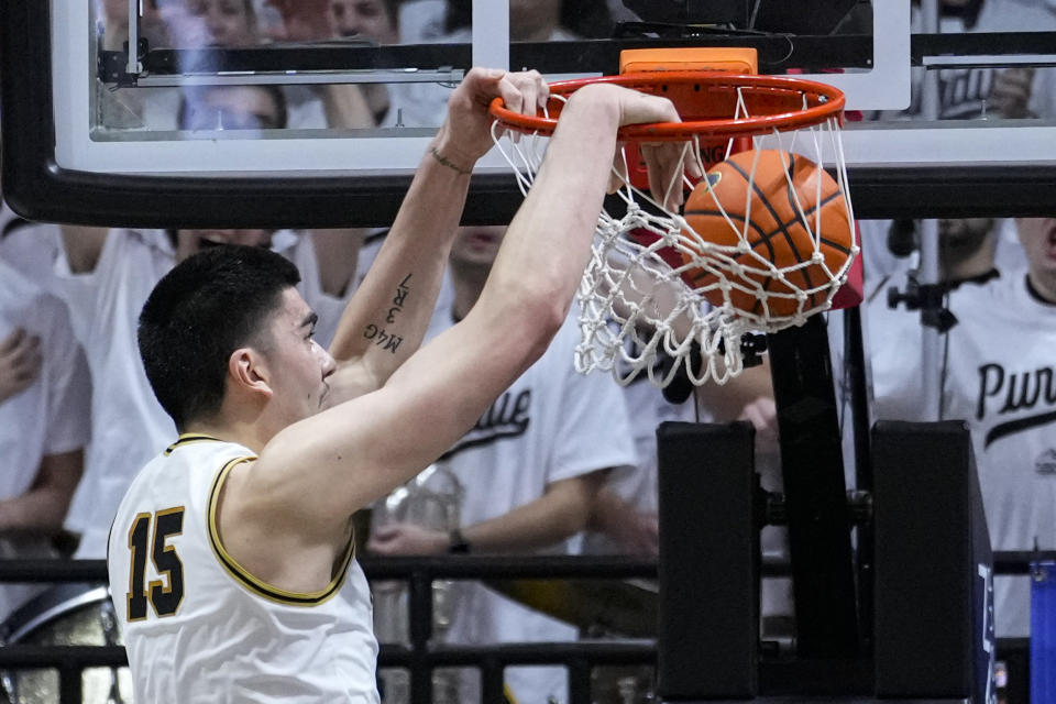 Purdue center Zach Edey (15) gets a basket on a dunk against Michigan State during the first half of an NCAA college basketball game in West Lafayette, Ind., Sunday, Jan. 29, 2023. (AP Photo/Michael Conroy)