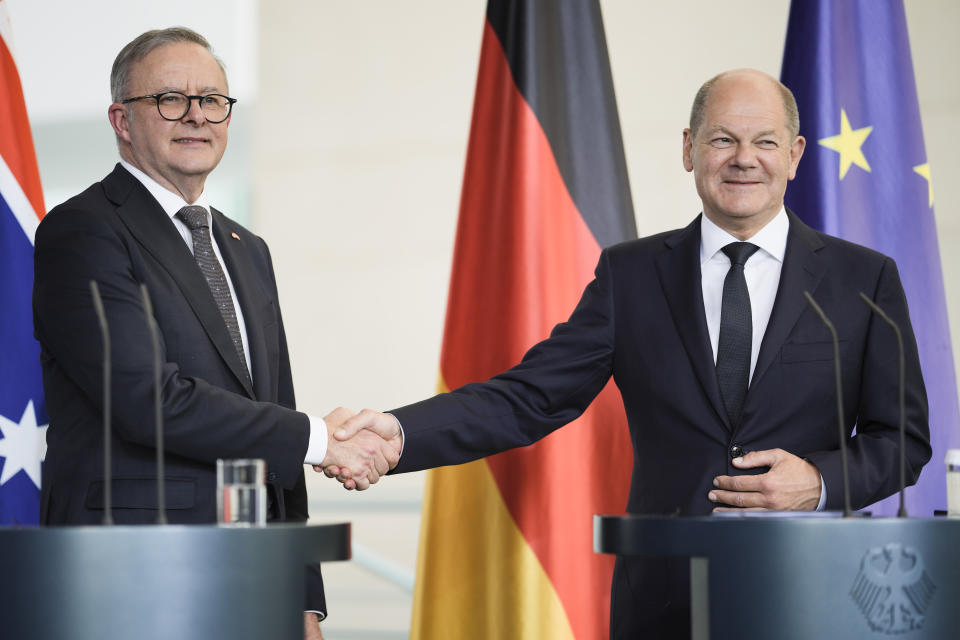 German Chancellor Olaf Scholz, right, and Australian Prime Minister Anthony Albanese shake hands after a news conference following a meeting at the chancellery in Berlin, Germany, Monday, July 10, 2023. (AP Photo/Markus Schreiber)