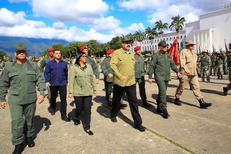 Venezuela's President Nicolas Maduro attends a military parade with the National Bolivarian Militia in Caracas, Venezuela December 17, 2018. Miraflores Palace/Handout via REUTERS