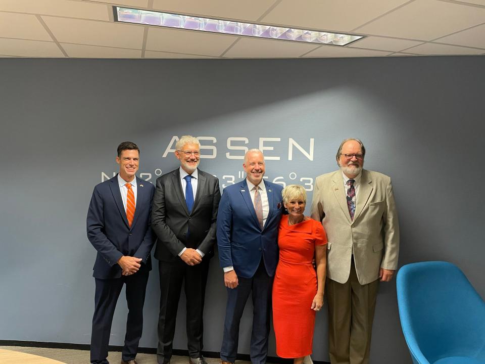 From left: Holland International Relations Commissioner Michael Start, Assen Mayor Marco Out, Holland Mayor Nathan Bocks, Elizabeth Bocks and Holland Councilmember Dave Hoekstra pose for a photo in Assen, the Netherlands, on Monday, Oct. 9, 2023.