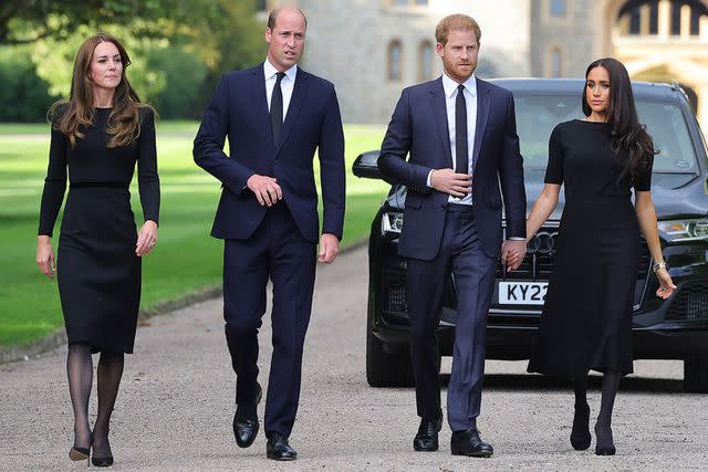 <p>Chris Jackson/Getty</p> Kate Middleton, Prince William, Prince Harry and Meghan Markle on the long Walk at Windsor Castle on September 10, 2022.