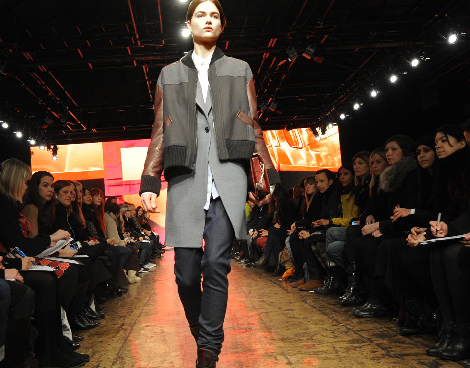 The DKNY Fall 2013 collection is modeled during Fashion Week, Sunday, Feb. 10, 2013, in New York. (AP Photo/Louis Lanzano)