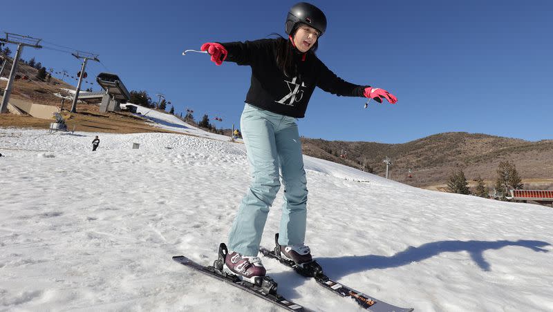First-time skier Camila Mendoza, of Equador, practices skiing at Park City Mountain Resort’s Canyons Village in Park City on Sunday, Nov. 28, 2021. Resort officials announced Monday that they will extend the resort’s operations through April 23, marking the resort’s longest season in 30 years.