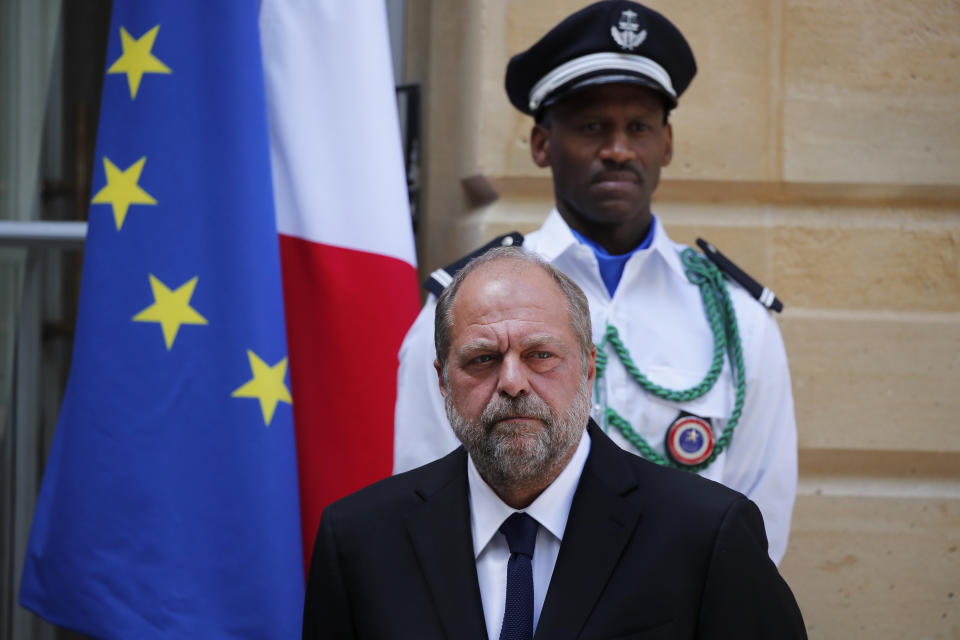 New French Justice Minister Eric Dupond-Moretti looks on during a handover ceremony with outgoing Justice Minister Nicole Belloubet at the Ministry of Justice in Paris, France, Tuesday July 7, 2020. Lawyer Dupond-Moretti has been appointed as the new Justice Minister after the government of Edouard Philippe had resigned on July 3, 2020, prompting a government and cabinet reshuffle. (AP Photo/Francois Mori)