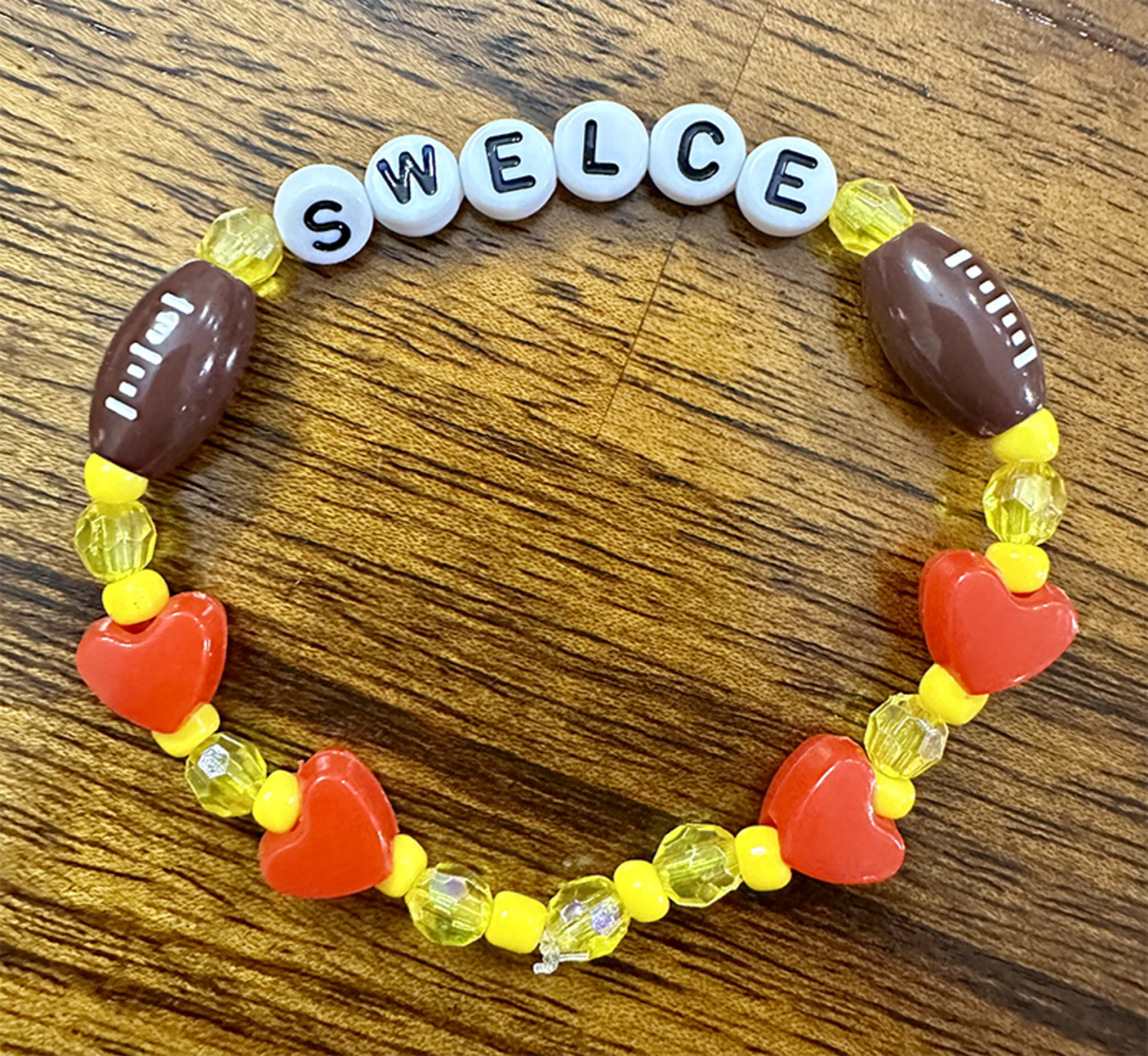 Bracelet with beads that spell out 