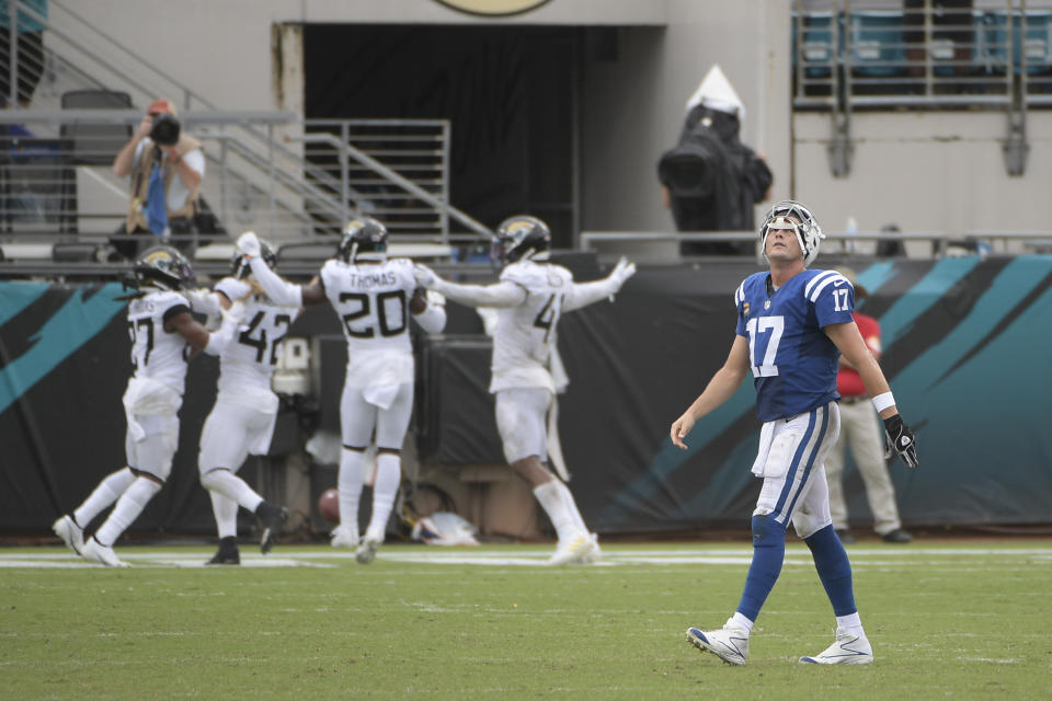 Philip Rivers (17) walks off the field after the Jaguars intercepted him, one of two picks the quarterback tossed in the Week 1 defeat. Next up for the Colts: the 0-1 Vikings. (AP Photo/Phelan M. Ebenhack)