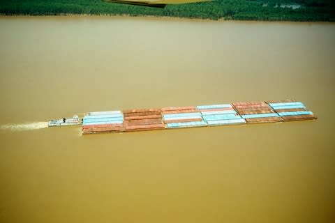 Huge barges carry loads equivalent to 2,500 trucks - Credit: GETTY