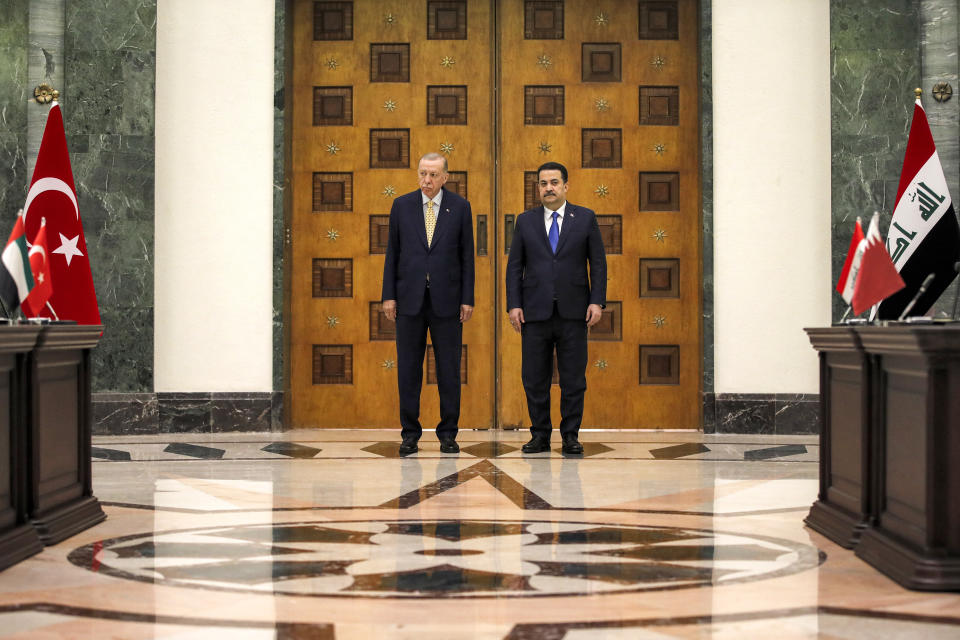 Iraq's Prime Minister Mohammed Shia al-Sudani, right, and Turkey's President Recep Tayyip Erdogan look on during their meeting in Baghdad, Iraq, Monday April 22, 2024. (Ahmad Al-Rubaye/Pool via AP)