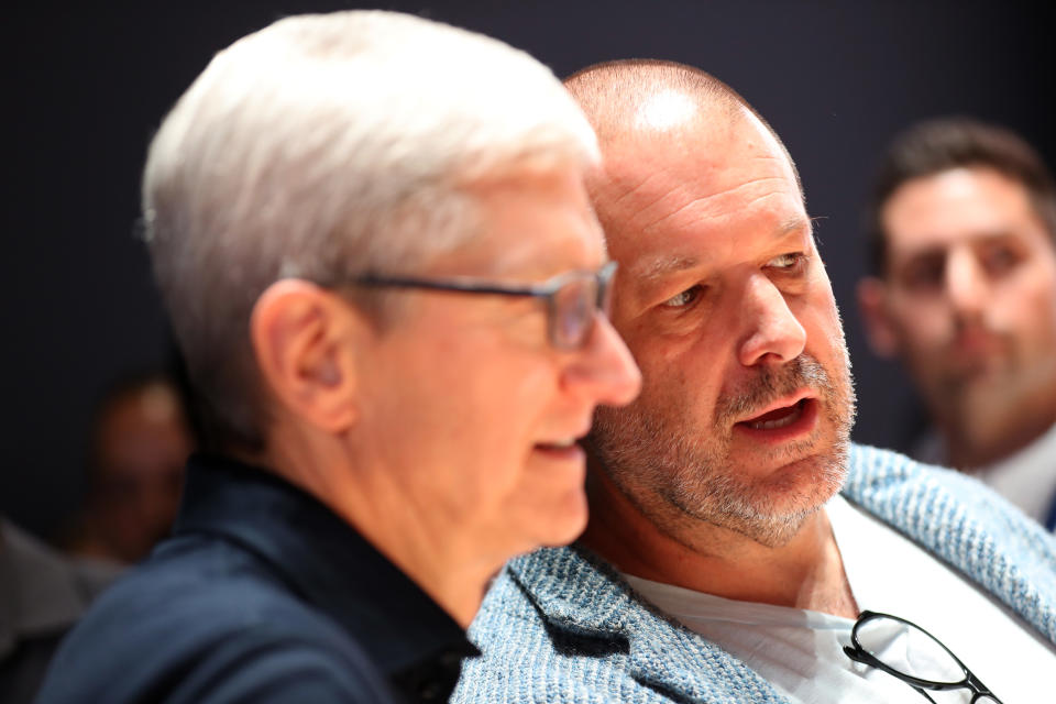 SAN JOSE, CALIFORNIA - JUNE 03: Apple CEO Tim Cook (L) and Apple chief design officer Jony Ive (R) look at the new Mac Pro during the 2019 Apple Worldwide Developer Conference (WWDC) at the San Jose Convention Center on June 03, 2019 in San Jose, California. The WWDC runs through June 7. (Photo by Justin Sullivan/Getty Images)