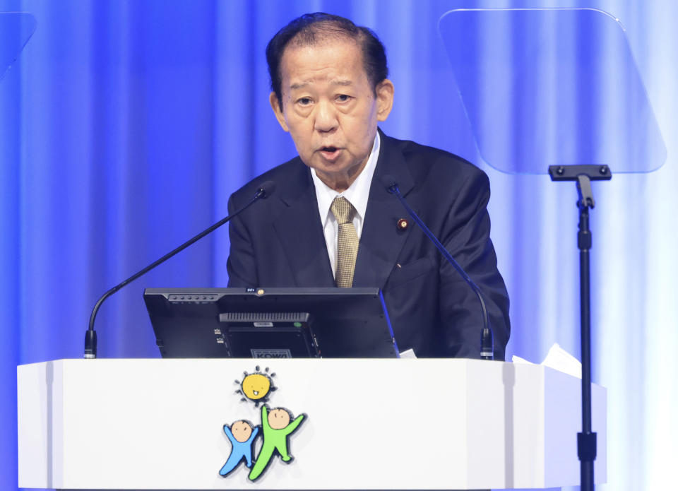 Japanese ruling Liberal Democratic Party (LDP) secretary general Toshihiro Nikai delivers a speech at the annual party convention amid outbreak of the new coronavirus in Tokyo Sunday, March 21, 2021. Japanese Prime Minister and LDP leader Yoshihide Suga pledged Sunday to do his utmost to prevent a resurgence of the coronavirus ahead of the Olympic torch relay and his upcoming visit to Washington. (Yoshikazu Tsuno/Pool Photo via AP)