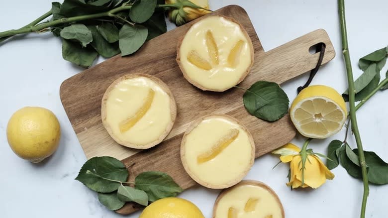 lemon tarts on cutting board