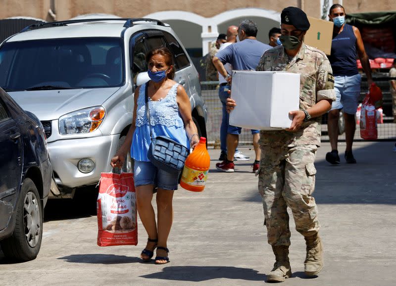 Lebanese army distributes aid to people in the aftermath of Beirut's massive explosion