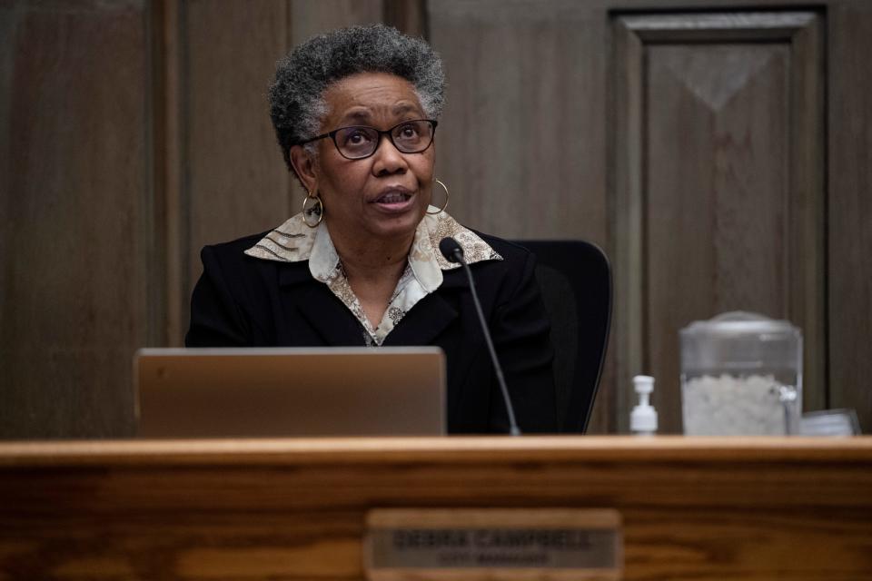 City Manager Debra Campbell looks up at a presentation Jan. 10 on the holiday outages that left thousands without water.