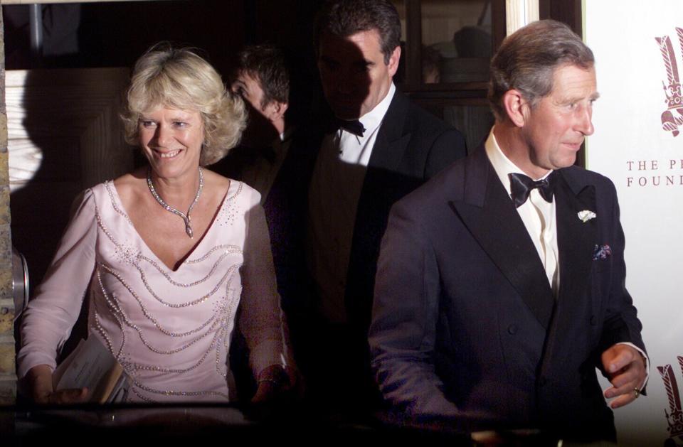 Prince Charles and Camilla Parker Bowles leave a reception at the headquarters of Charles' new Charity the Prince's Foundation in Hoxton, East London on June 20, 2000