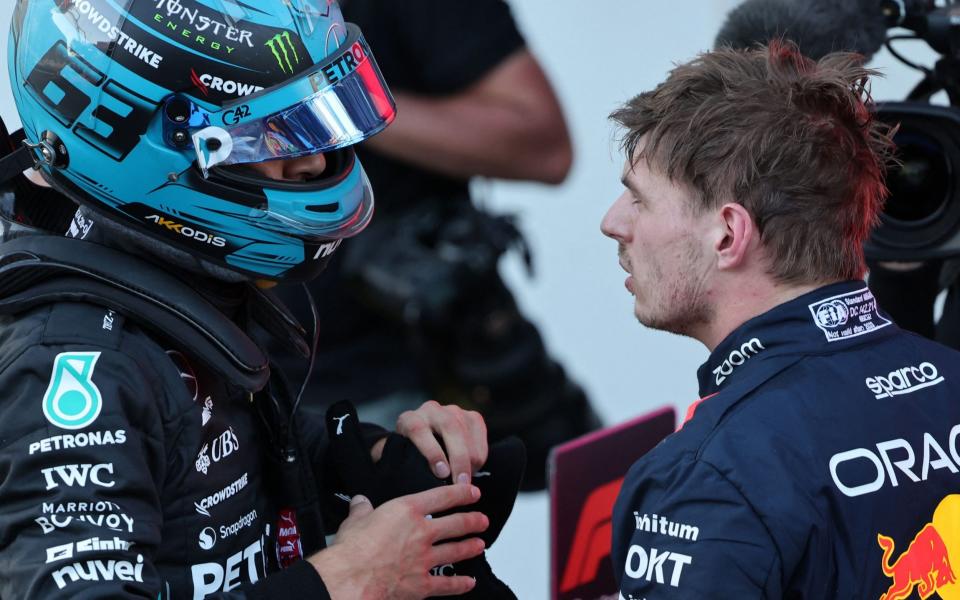 Mercedes' British driver George Russell and Red Bull Racing's Dutch driver Max Verstappen after the sprint race ahead of the Formula One Azerbaijan Grand Prix at the Baku City Circuit in Baku - Getty Images/Guiseppe Cacace