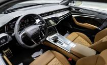 <p>RS logos can be found throughout the interior, and multiple interior design packages are available that add exotic materials such as Alcantara, carbon fiber, and aluminum trim.</p>