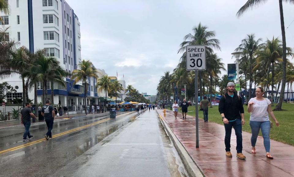 Light rain showers forced people off Ocean Drive just after 2 p.m. in Miami Beach on Saturday -- and just a little more than 24 hours before the Big Games was scheduled to start in Miami Gardens.