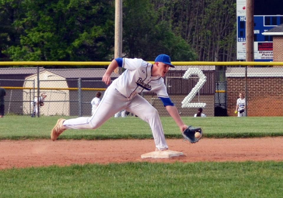 Clear Spring shortstop Dawson Kehr scoops up a grounder during the Blazers' 11-1 win over Hancock in the 1A West Region II quarterfinals.