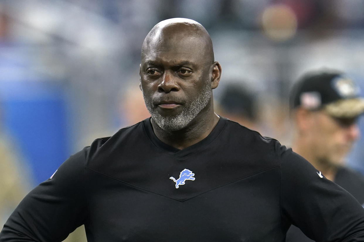Anthony Lynn, Detroit Lions Offensive Coordinator, watches during warmups before an NFL football game against the Philadelphia Eagles in Detroit, Sunday, Oct. 31, 2021. (AP Photo/Paul Sancya)