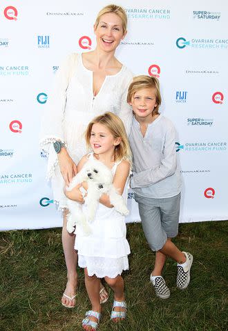 <p>Sonia Moskowitz/WireImage</p> Kelly Rutherford with her kids Helena and Hermes in 2015.