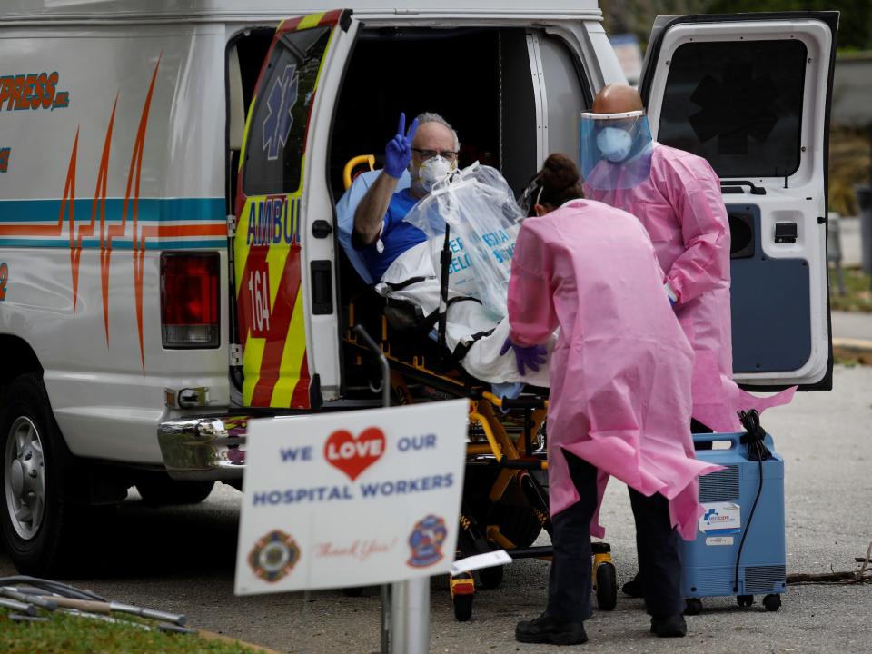 florida coronavirus patient stretcher ambulance fort lauderdale