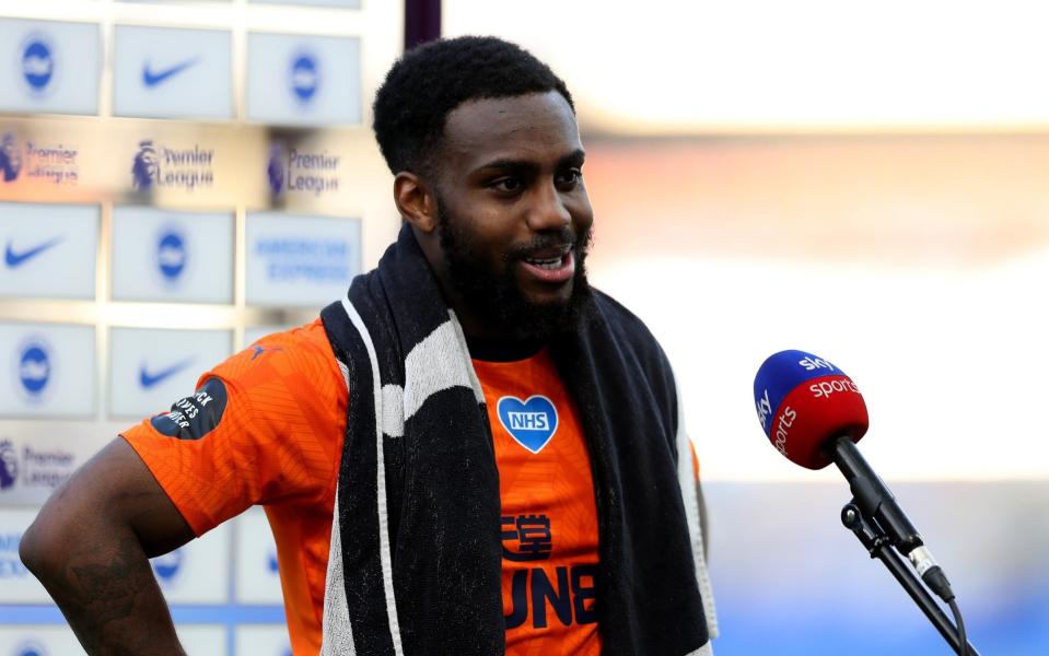 Danny Rose of Newcastle United speaks to the media pitchside after the Premier League match between Brighton & Hove Albion and Newcastle United  - Getty Images