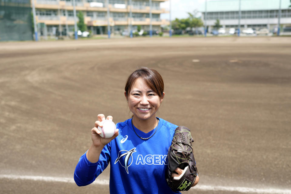 Eri Yoshida of a Japanese women's baseball team Agekke, poses for a photo at the team's practice field in Oyama, Tochigi prefecture, north of Tokyo, Tuesday, May 30, 2023. The 31-year-old Japanese woman is a knuckleball pitcher with a sidearm delivery that she hopes might carry her to the big leagues in the United States or Japan. (AP Photo/Shuji Kajiyama)