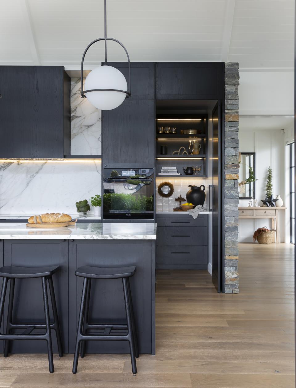 black kitchen with lighting