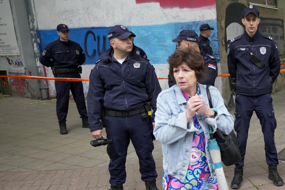 Police block streets around the Vladislav Ribnikar school in Belgrade, Serbia, Wednesday, May 3, 2023. A teenage boy opened fire early Wednesday in a school in central Belgrade, causing injuries. (AP Photo/Darko Vojinovic)