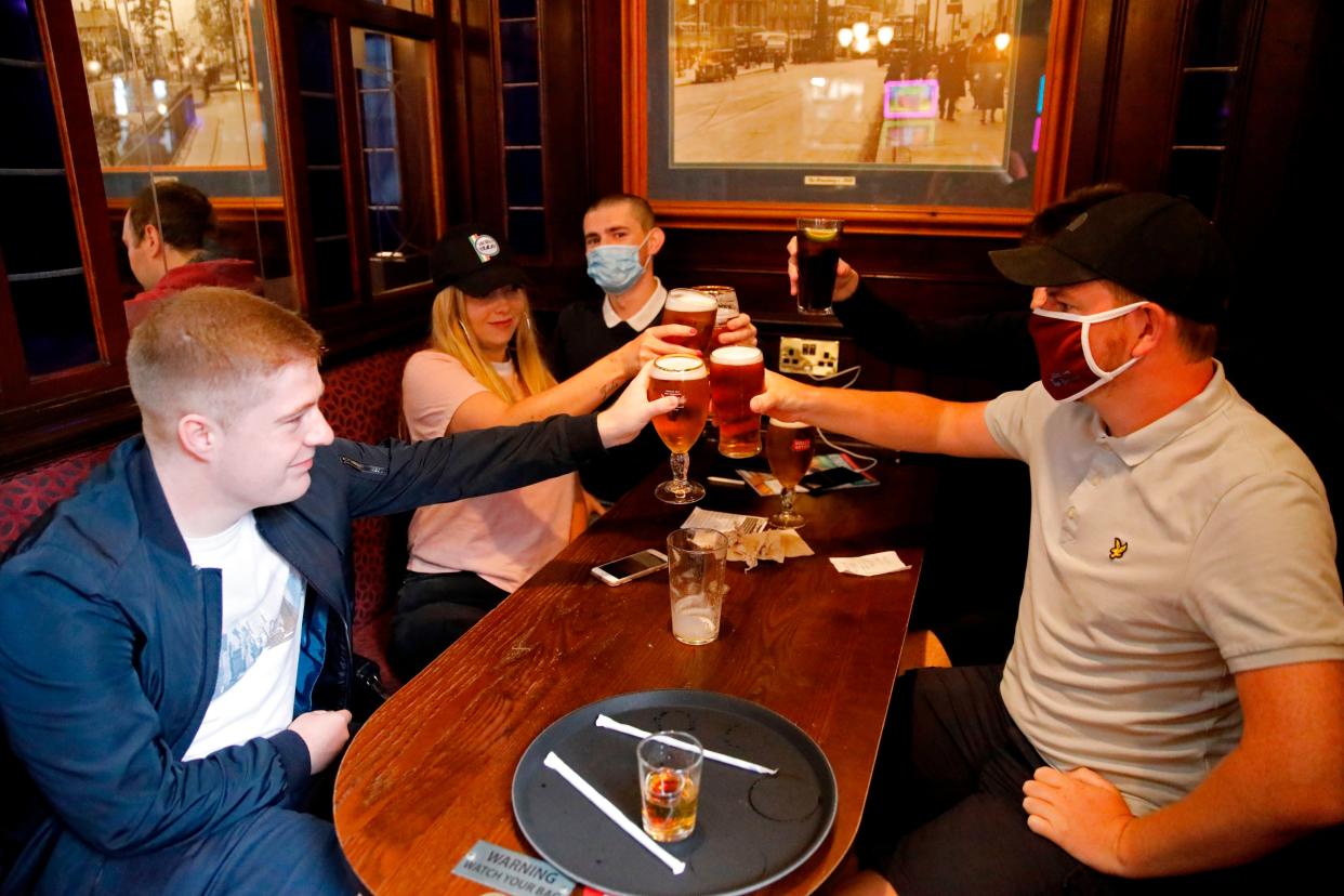 <p>Pubs will be allowed to serve food and drinks indoors for the first time since last year</p> (AFP via Getty Images)