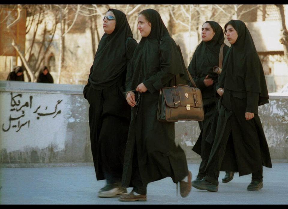 The Chador is more common to Iran. It is a long billowing dress that leaves the face open but covers the wrists and ankles. Chador's in a more plain black color with less decorative embellishments.