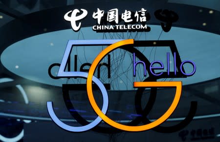 FILE PHOTO: A sign of 5G is pictured at the booth of China Telecom during an internet expo at the fifth WIC in Wuzhen