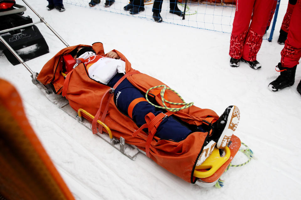 <p>Yuto Totsuka of Japan is stretched off by medical staff after crashing in the during the Snowboard Men’s Halfpipe Final on day five of the PyeongChang 2018 Winter Olympics at Phoenix Snow Park on February 14, 2018 in Pyeongchang-gun, South Korea. (Photo by Cameron Spencer/Getty Images) </p>