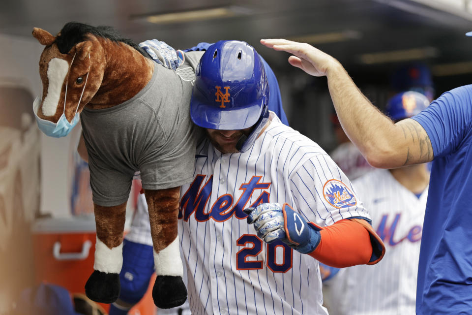 New York Mets' Pete Alonso celebrates after hitting a two-run home run in the sixth inning against the Toronto Blue Jays during a baseball game Sunday, July 25, 2021, in New York. (AP Photo/Adam Hunger)