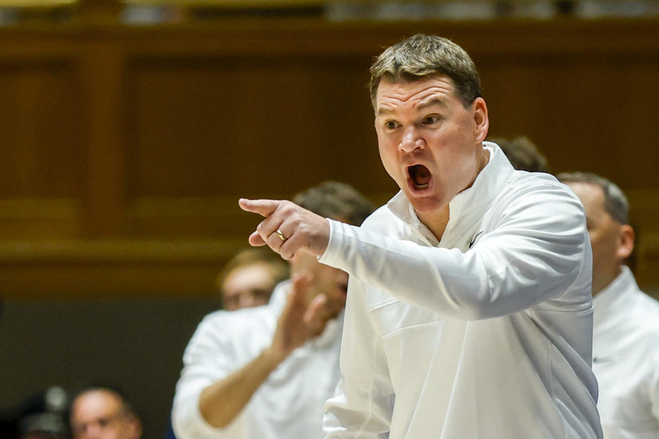 Arizona head coach Tommy Lloyd argues with an official during the second half of an NCAA college basketball game against Duke in Durham, N.C., Friday, Nov. 10, 2023. (AP Photo/Nell Redmond)