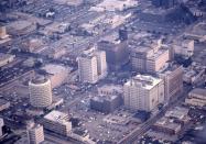 <p>Hollywood continued to get more and more developed throughout the 1900s. This aerial shot shows major city spots like the Capitol Records building, Hotel Knickerbocker, and the corner of Hollywood and Vine. <br></p>